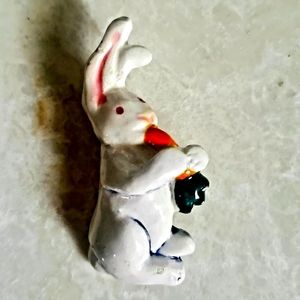 Vintage fairycore cottagecore White Easter bunny, rabbit, hare eating a carrot